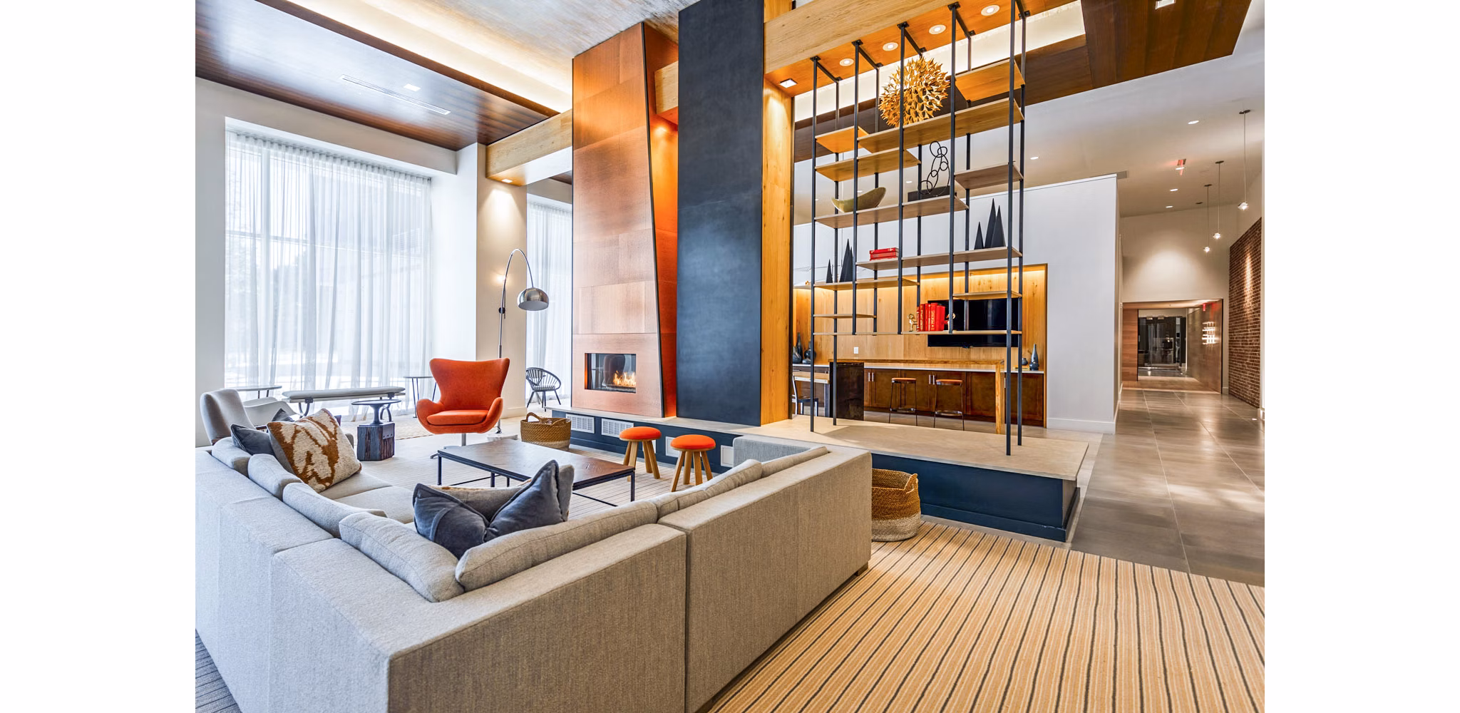 Modern clubhouse with cozy seating areas at VY Reston Heights Apartments, ideal for gatherings and relaxation in vibrant Reston community