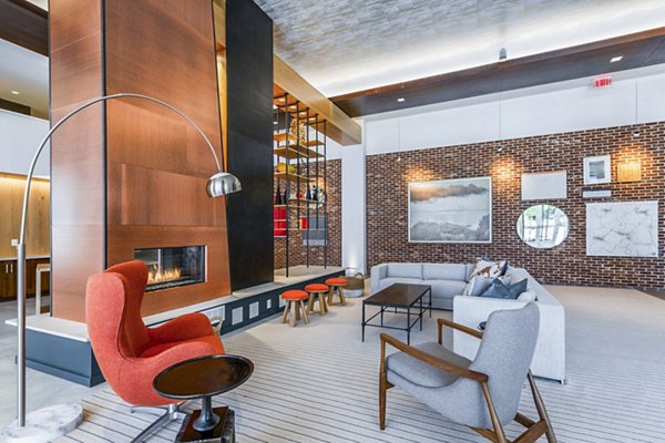 Clubhouse at VY Reston Heights: Modern gathering space with premium seating and gaming areas in a luxury apartment community