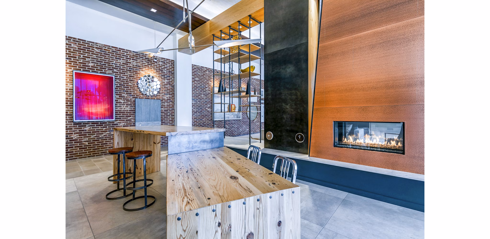 Clubhouse featuring modern design and comfortable seating at VY Reston Heights Apartments, ideal for social gatherings and relaxation