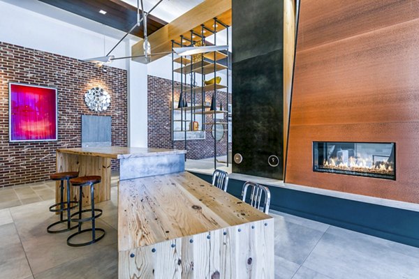 Clubhouse featuring modern design and comfortable seating at VY Reston Heights Apartments, ideal for social gatherings and relaxation