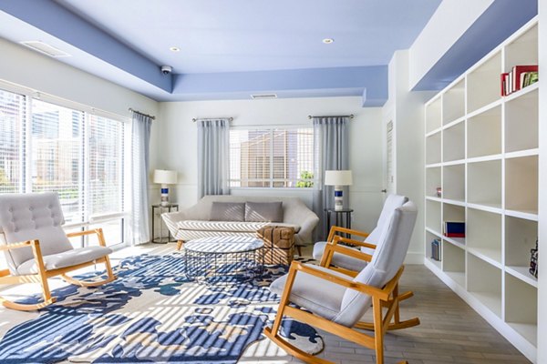 Clubhouse with cozy seating and modern decor at VY Reston Heights Apartments