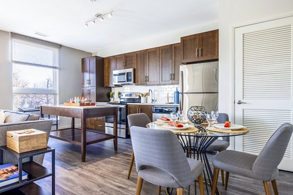Dining room featuring modern decor and pendant lighting at VY Reston Heights Apartments, luxury living near Washington, DC