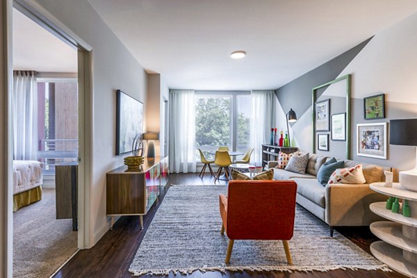 Contemporary living room with modern furnishings and natural light at VY Reston Heights luxury apartments