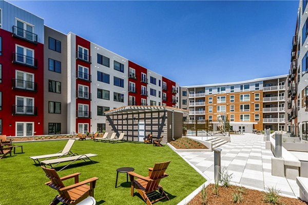 Stylish patio with modern furniture at VY Reston Heights Apartments, perfect for outdoor relaxation and social gatherings