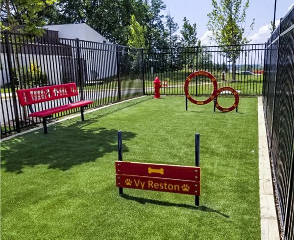Dog park with agility equipment at VY Reston Heights Apartments
