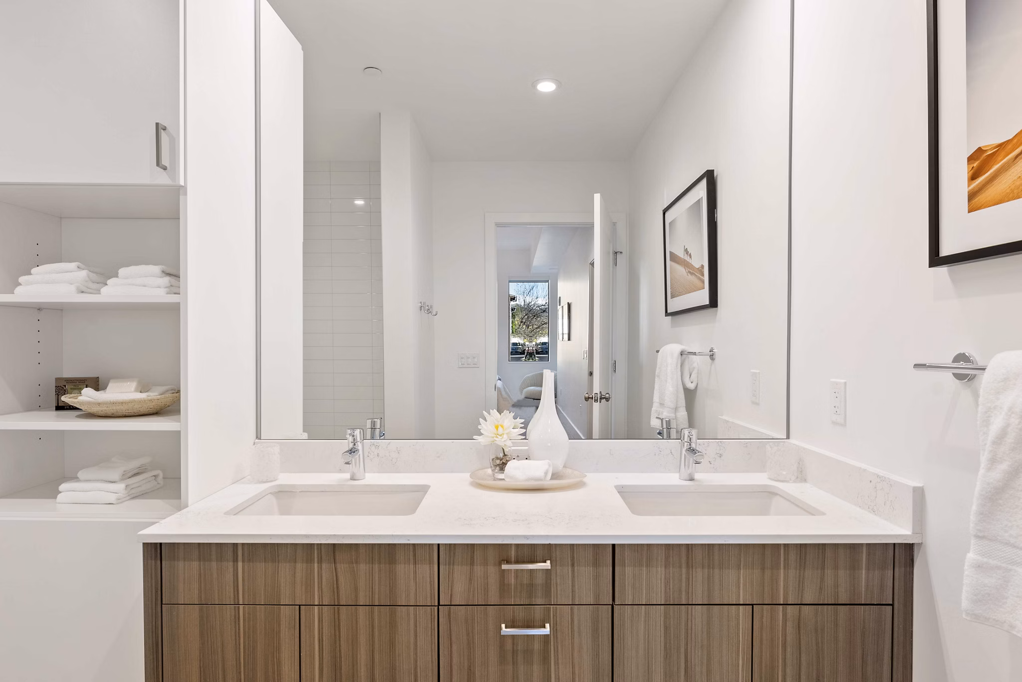 Modern bathroom with sleek fixtures at Bluff at Boulder Commons Apartments