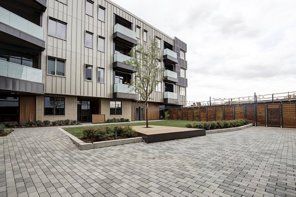 Scenic courtyard with cozy seating at Bluff at Boulder Commons Apartments offering luxury living near Boulder trails