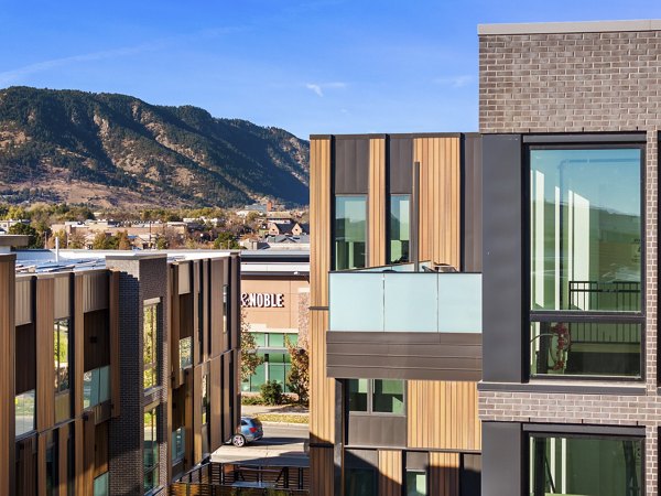 Modern luxury apartments with mountain views in a serene landscape