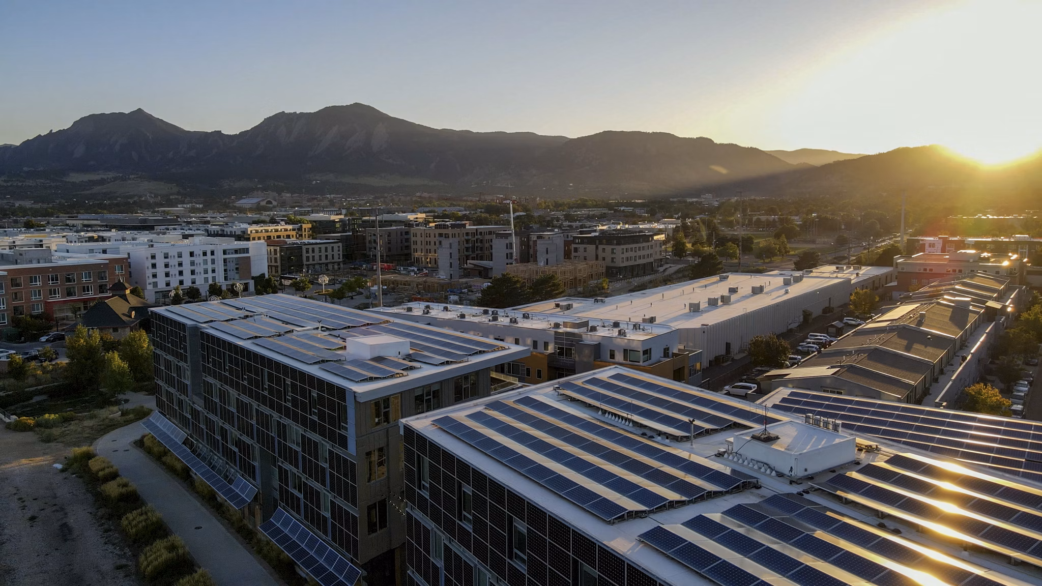 Bluff at Boulder Commons: Scenic view of luxury apartments nestled in a serene environment