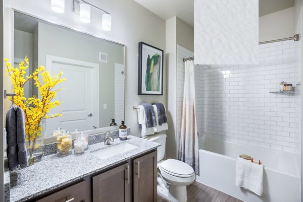 Bathroom featuring modern fixtures and elegant design at Allora Alamo Heights Apartments