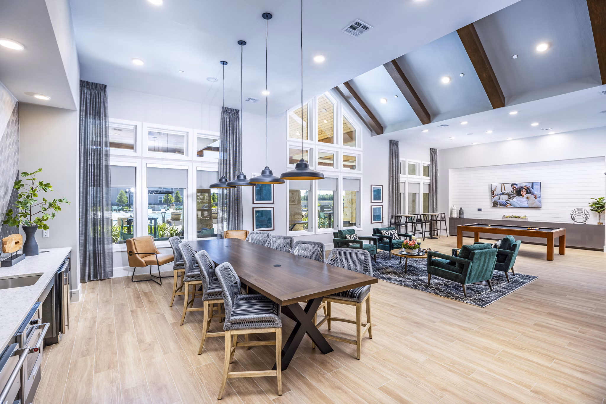 Modern clubhouse with comfortable seating and ambient lighting at Allora Alamo Heights Apartments, ideal for resident gatherings and relaxation