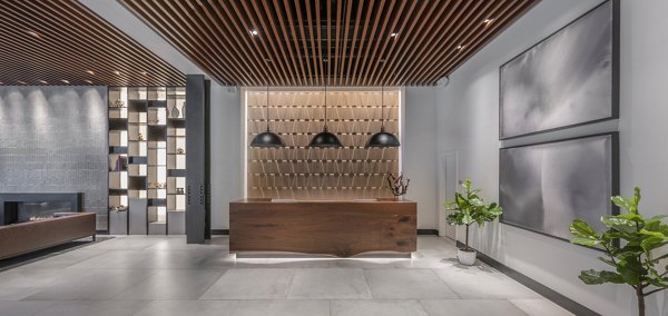 Clubhouse featuring modern design and comfortable seating at The Alyx Apartments