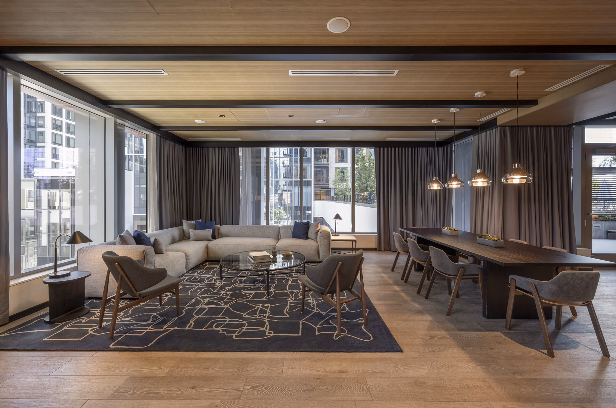 Clubhouse featuring modern design and cozy seating at The Alyx Apartments in Miami