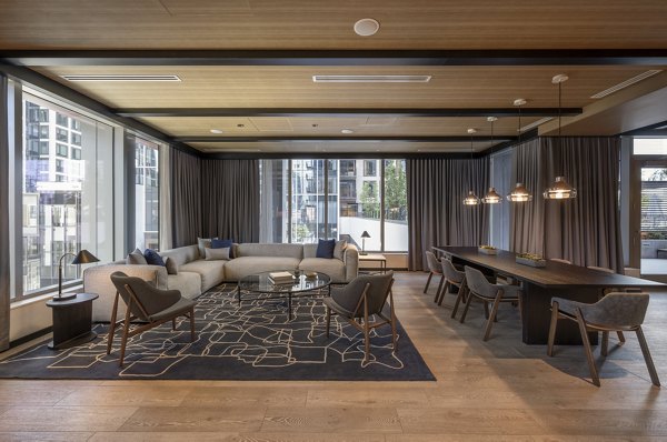 Clubhouse featuring modern design and cozy seating at The Alyx Apartments in Miami
