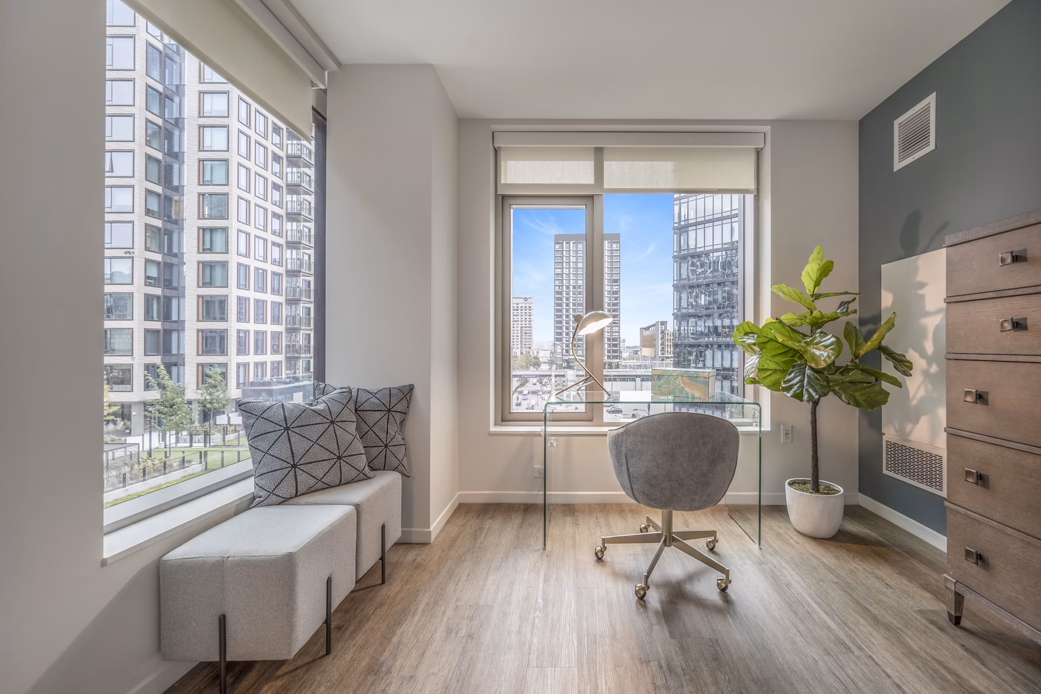Home office featuring modern desk and ergonomic chair at The Alyx Apartments
