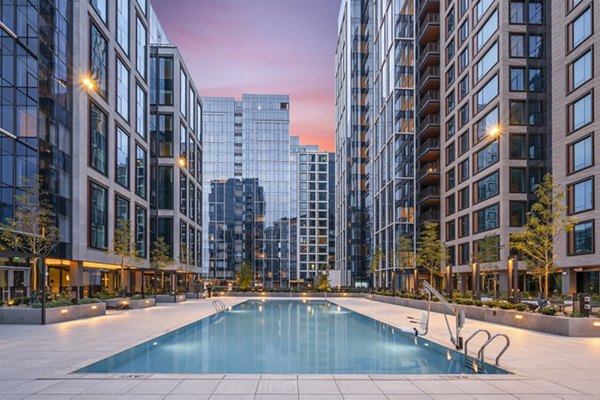 Stunning rooftop pool with panoramic views at The Alyx Apartments