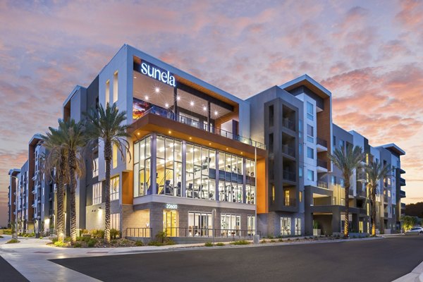 Sunela Apartments: Modern luxury building in vibrant neighborhood