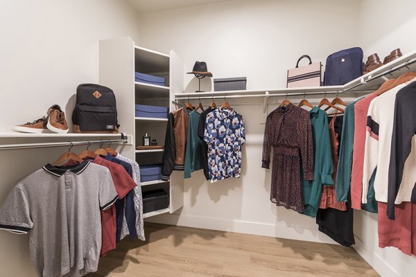 Bedroom closet with ample storage space at Sunela Apartments
