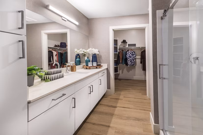 Bathroom featuring sleek fixtures and contemporary design at Sunela Apartments