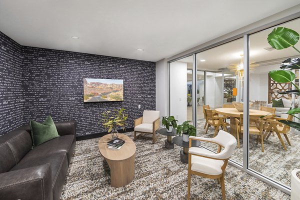 Clubhouse featuring modern design and social spaces at Sunela Apartments, a Greystar luxury property