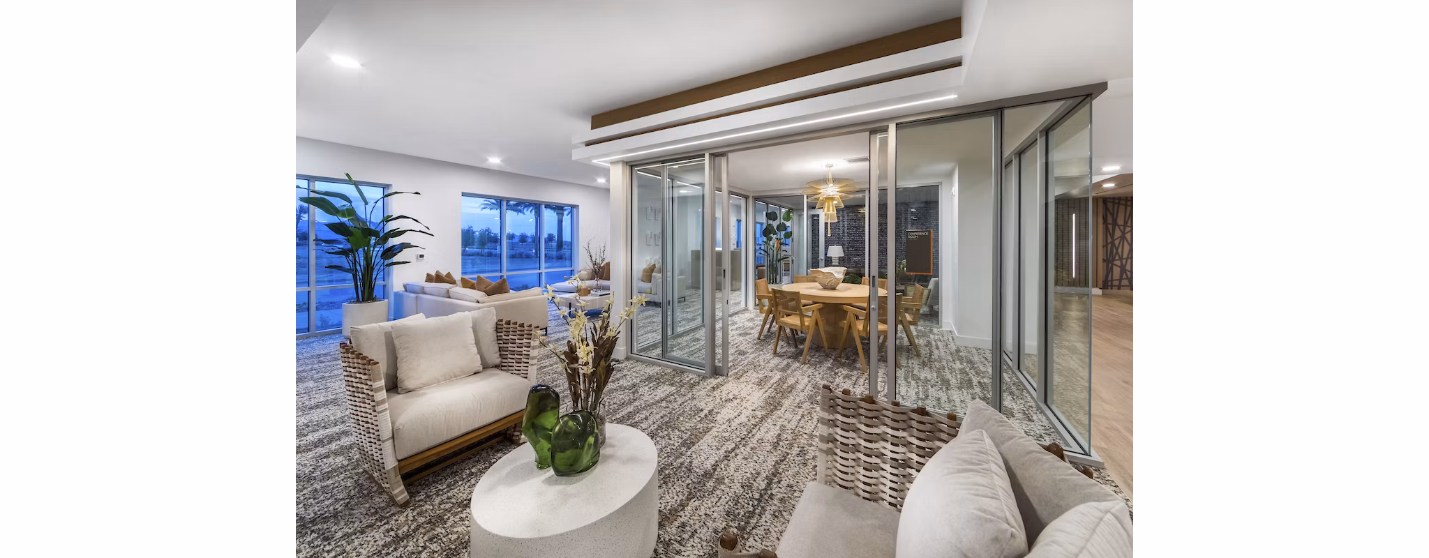 Elegant clubhouse with modern decor and cozy seating at Sunela Apartments