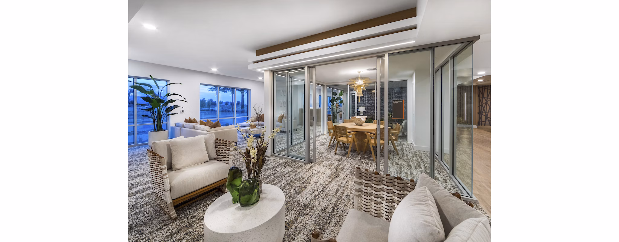 Elegant clubhouse with modern decor and cozy seating at Sunela Apartments