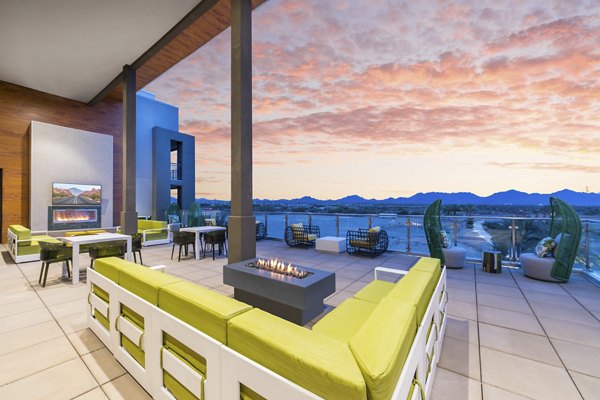 Cozy fire pit on a stylish patio at Sunela Apartments Ideal for relaxing evenings outdoors at these luxury apartments
