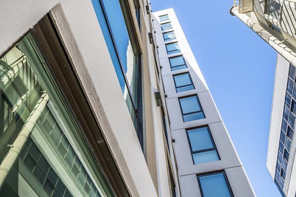 Vance Apartments: Elegant building showcasing modern architecture in a luxury setting