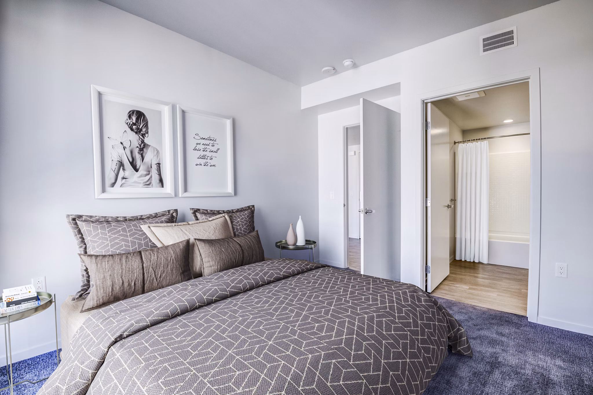 Cozy bedroom with contemporary decor at Vance Apartments