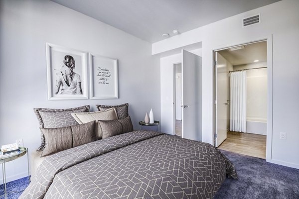 Cozy bedroom with contemporary decor at Vance Apartments