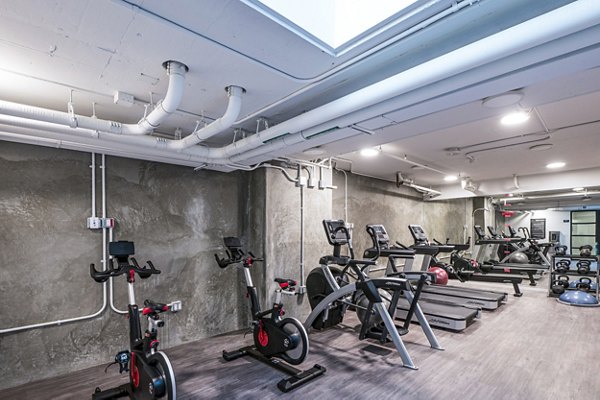 Fitness center with modern equipment at Vance Apartments