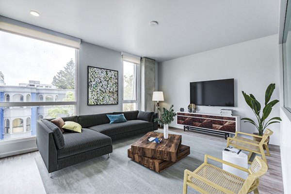Spacious living room with modern furnishings at Vance Apartments luxury homes