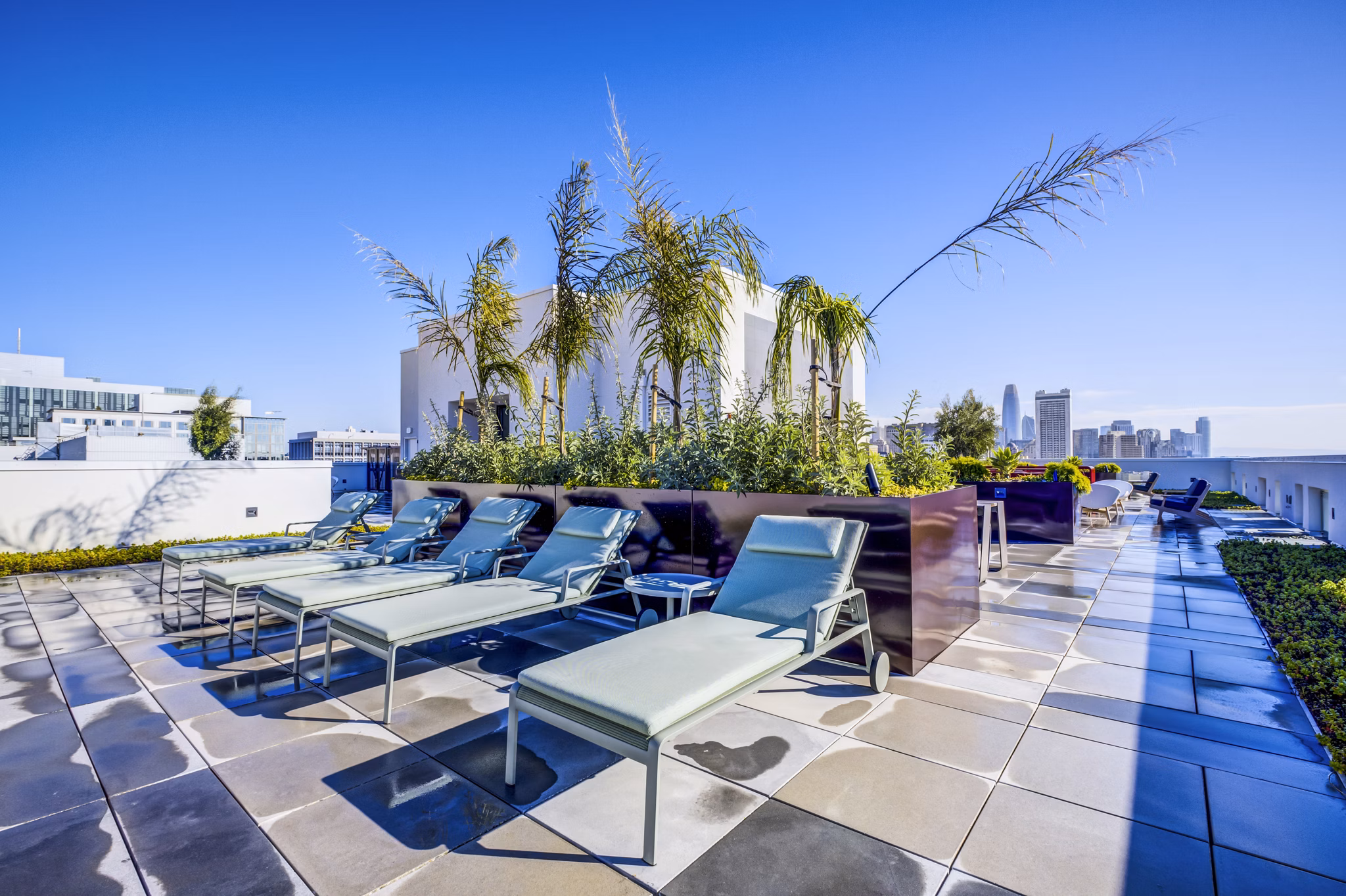 Cozy patio with modern furnishing at Vance Apartments: luxury living space for relaxation in vibrant city environment