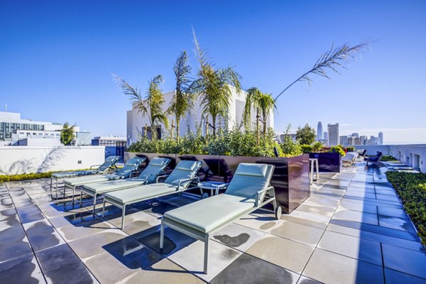 Cozy patio with modern furnishing at Vance Apartments: luxury living space for relaxation in vibrant city environment
