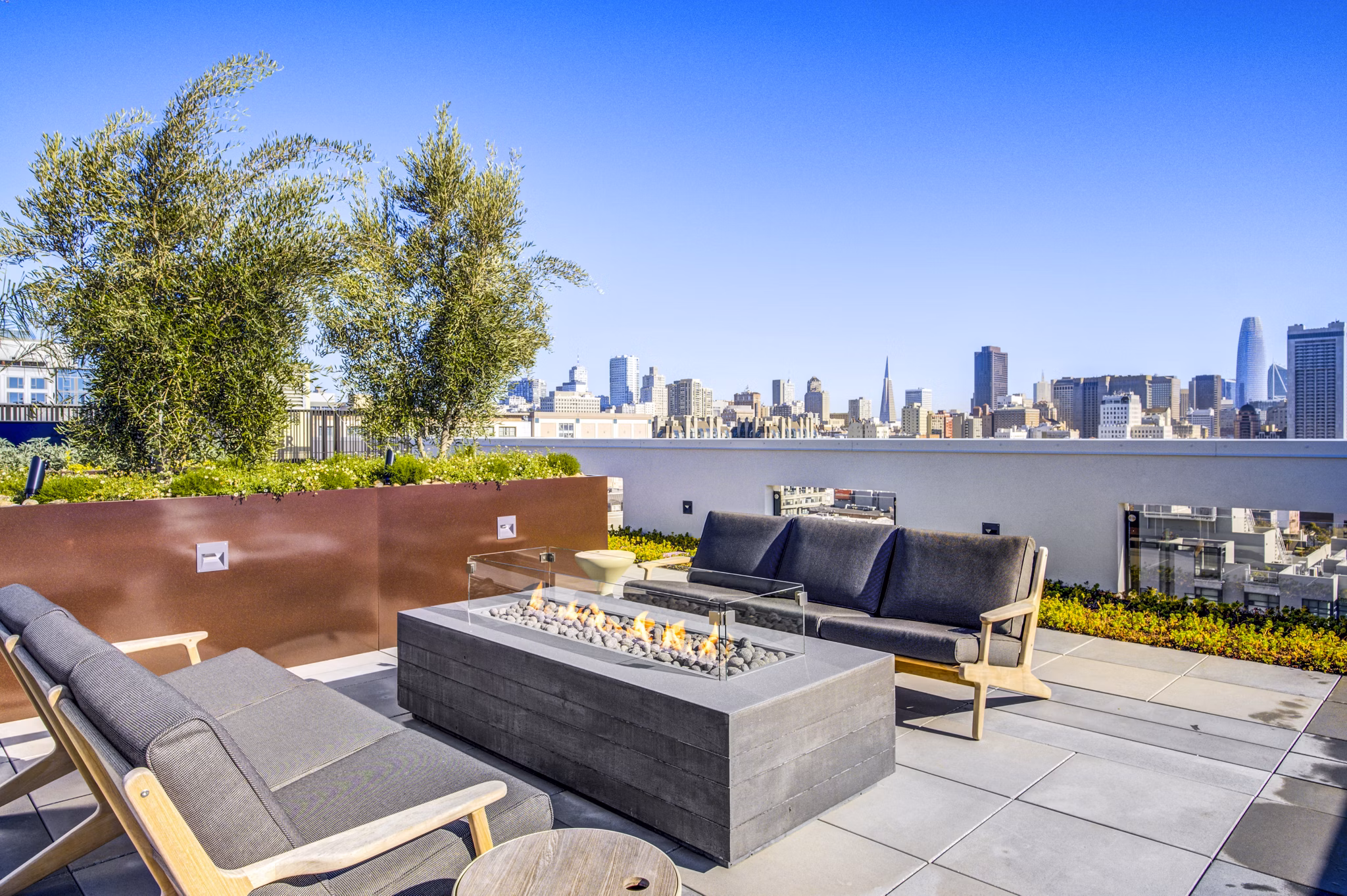 Cozy fire pit on a stylish patio at Vance Apartments, perfect for relaxation and social gatherings