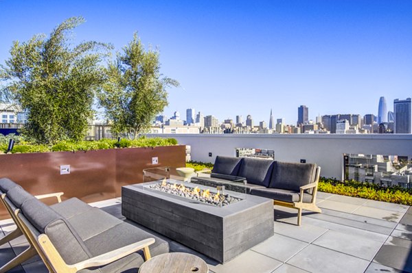 Cozy fire pit on a stylish patio at Vance Apartments, perfect for relaxation and social gatherings