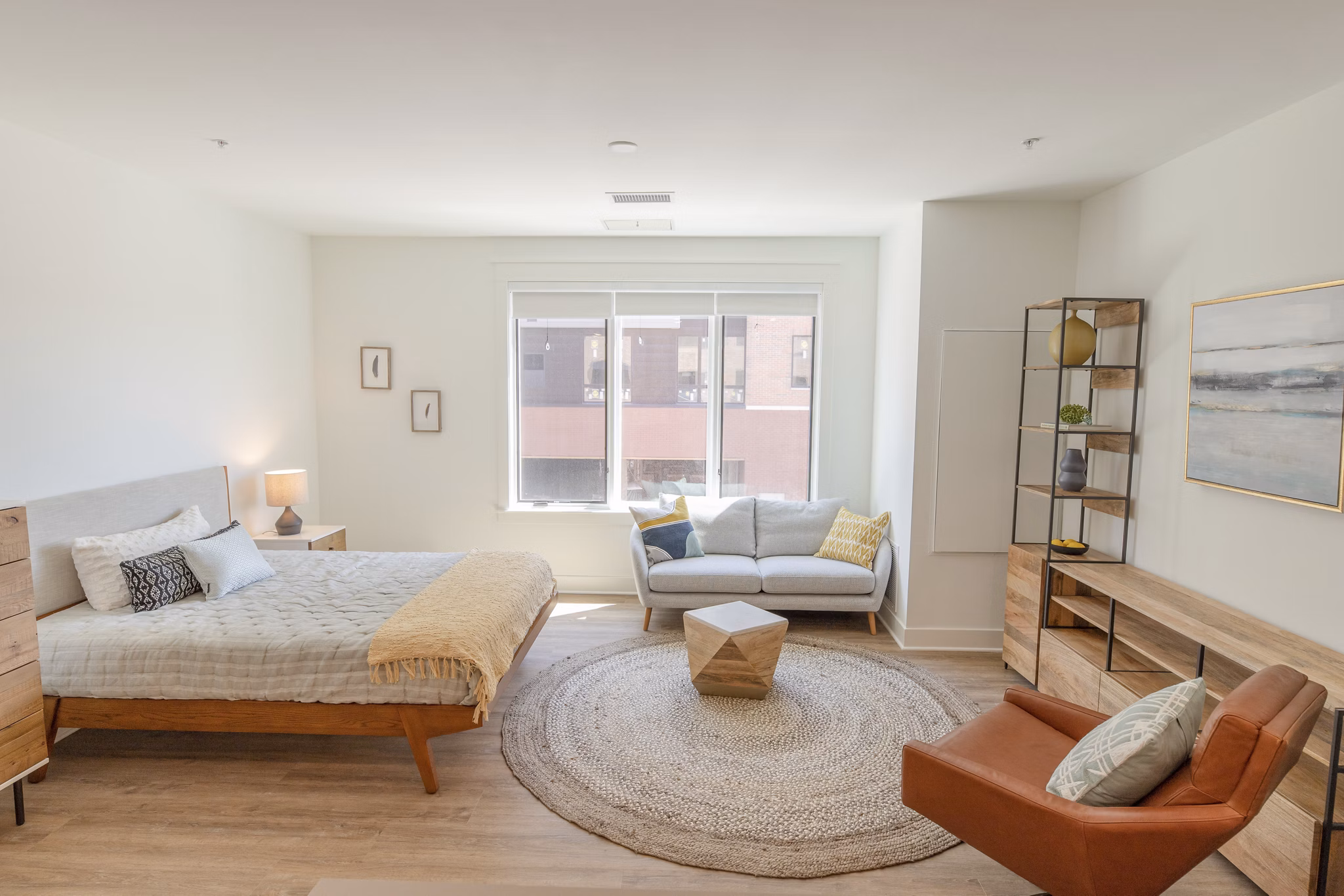 Cozy bedroom with modern decor in Harrison Yards Apartments