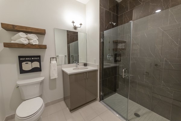 Modern bathroom with sleek fixtures in Harrison Yards Apartments