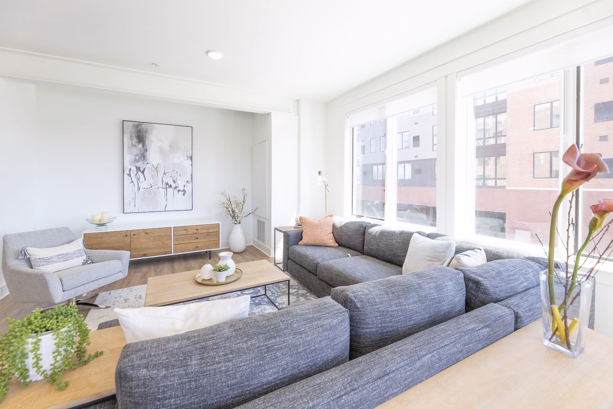 Spacious living room with modern decor in Harrison Yards Apartments