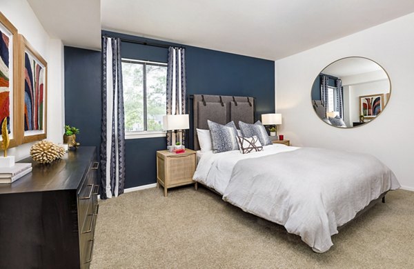 Contemporary bedroom with cozy decor at Cobalt Ridge Apartments, offering a serene retreat within luxury living spaces
