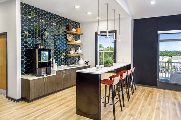 Contemporary club lounge with fireplace at Cobalt Ridge Apartments offering luxury amenities and stylish design