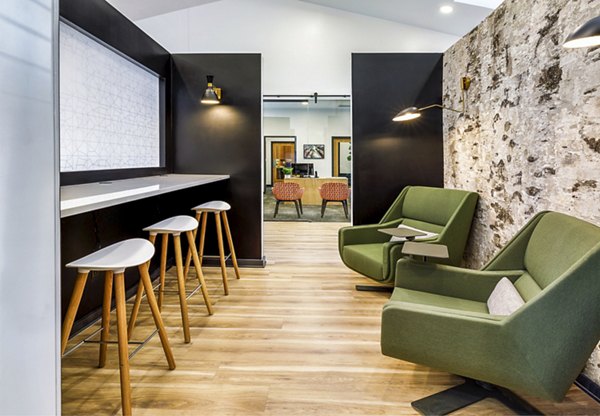 Modern clubhouse featuring lounge and billiards room at Cobalt Ridge Apartments