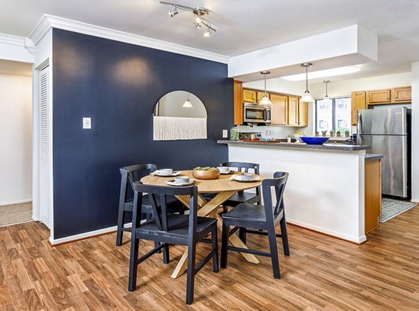 Spacious dining room with elegant lighting and modern decor at Cobalt Ridge Apartments