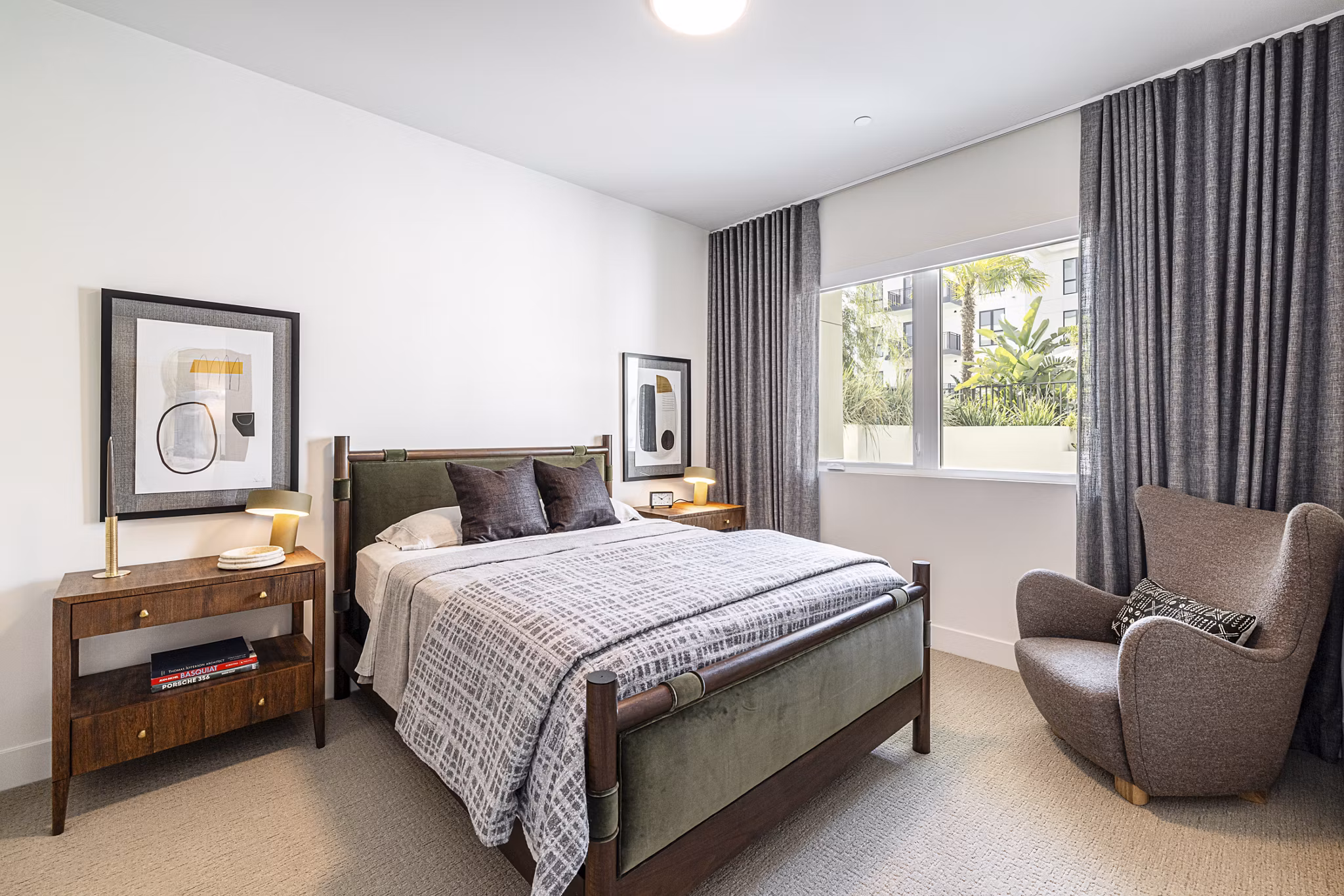 Bedroom with cozy decor and natural light at Hollywood Park Apartments