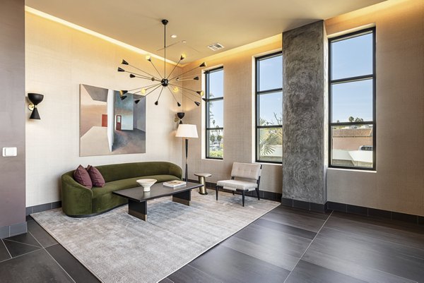 Luxury clubhouse with modern design at Hollywood Park Apartments, offering premium amenities for residents in a vibrant community setting