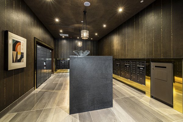 Mail room with secure package lockers at Hollywood Park Apartments
