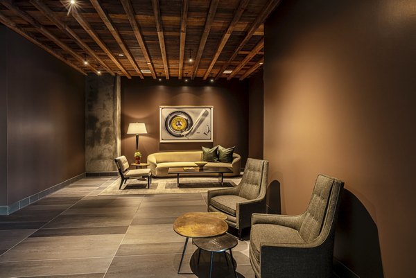 Clubhouse featuring modern design and cozy seating areas at Hollywood Park Apartments