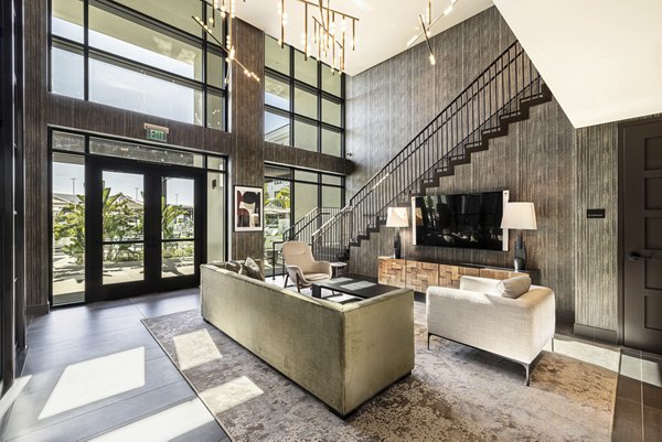 Chic clubhouse with plush seating and modern decor at Hollywood Park Apartments