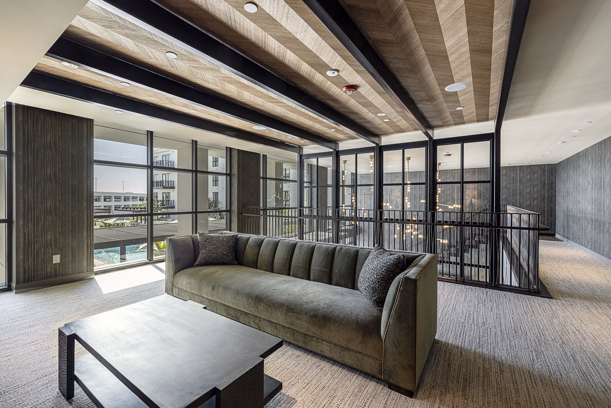 Clubhouse featuring modern decor and comfortable seating at Hollywood Park Apartments, a luxurious living community