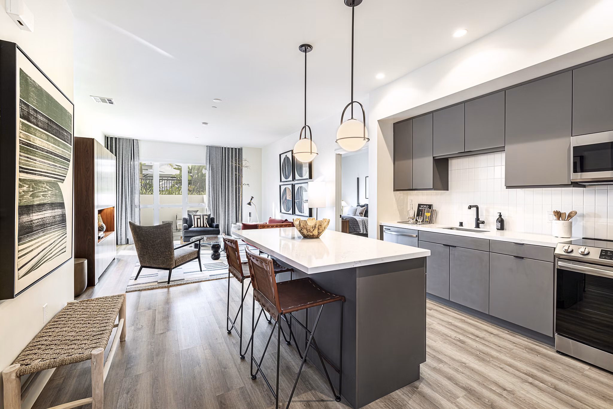 Modern kitchen with stainless steel appliances at Hollywood Park Apartments